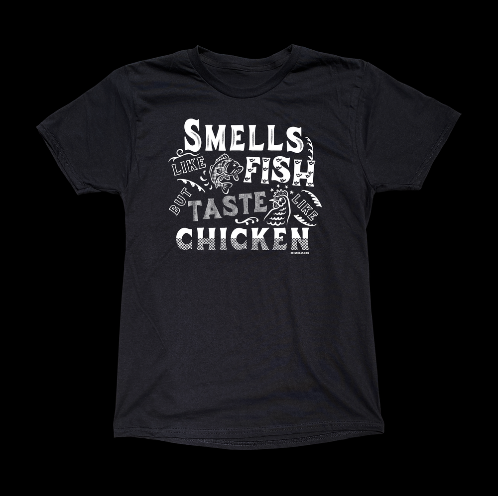 SMELLS LIKE FISH BUT TASTE LIKE CHICKEN BLACK TEE - cristocatofficial